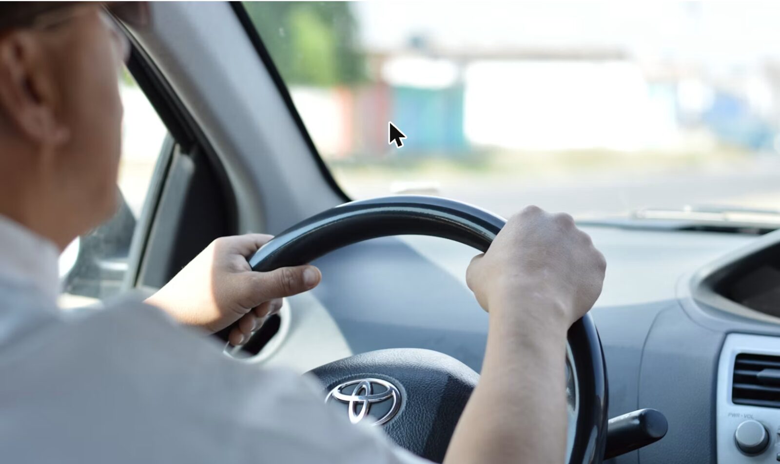 Driving instructor and student practising in Timperley